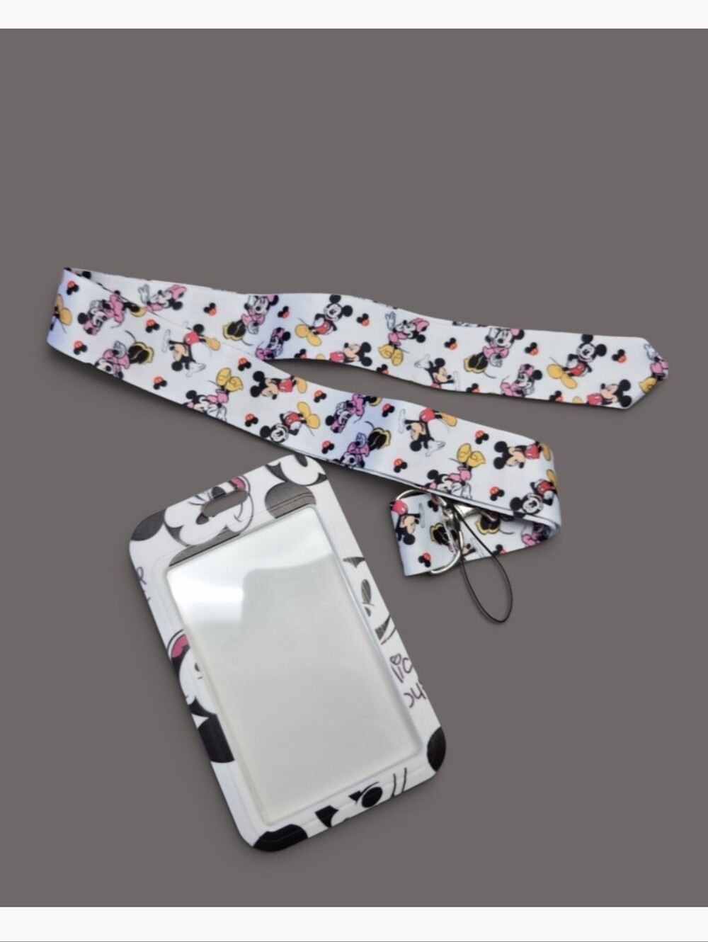 Mickey and Minnie Mouse ID badge holder set featuring matching printed lanyard